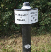 One of a series of half-bobbin cast iron mileposts d. 1819, Trent & Mersey Canal